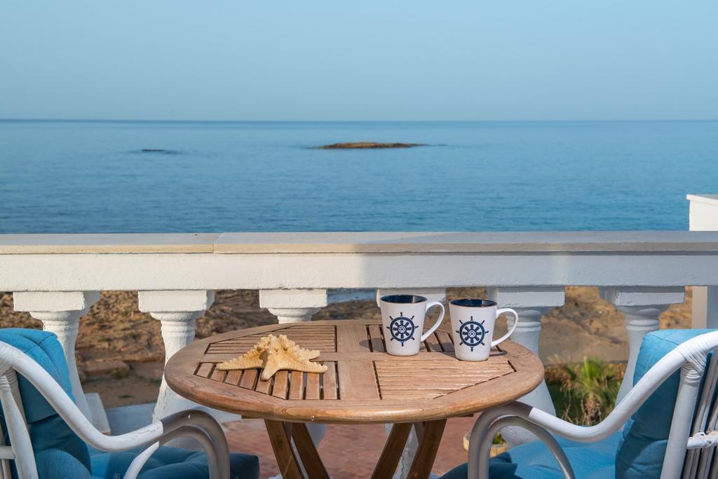 Pyrgos Blue Aparthotel มาเลีย ภายนอก รูปภาพ